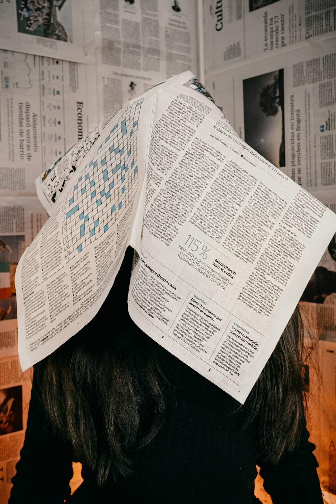 person reading newspaper